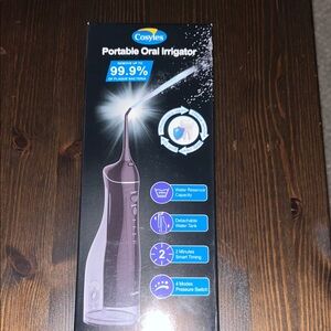 Black Portable Oral Irrigator brand new still in box